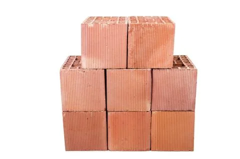 Stack of clay bricks isolated on white Stock Photos