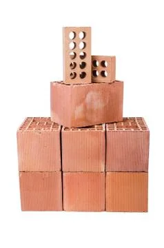Stack of clay bricks isolated on white Stock Photos