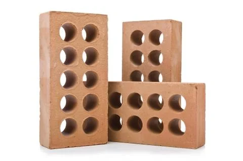 Stack of clay bricks isolated on white Foto stock