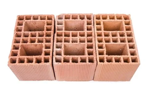 Stack of clay bricks isolated on white Stock Photos