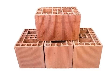 Stack of clay bricks isolated on white 写真素材