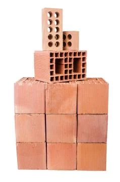 Stack of clay bricks isolated on white Stock Photos