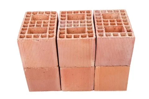Stack of clay bricks isolated on white Stock Photos