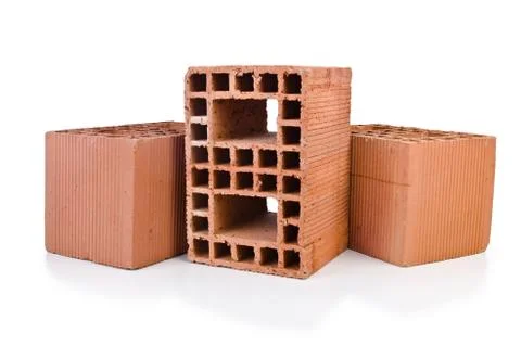 Stack of clay bricks isolated on white 스톡 사진
