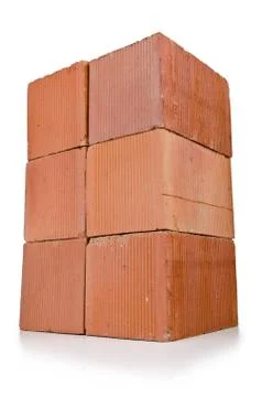 Stack of clay bricks isolated on white 写真素材