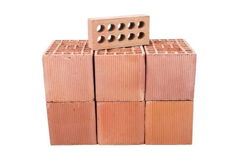 Stack of clay bricks isolated on white Stock Photos
