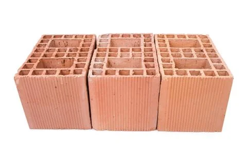 Stack of clay bricks isolated on white Stockfoto's
