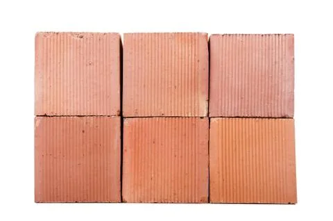 Stack of clay bricks isolated on white Foto stock