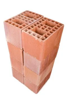 Stack of clay bricks isolated on white Stock Photos
