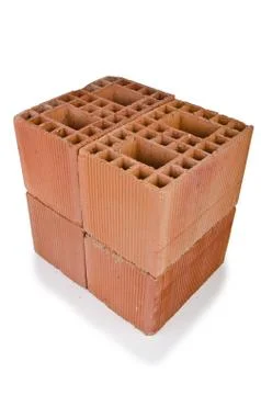 Stack of clay bricks isolated on white Stock Photos