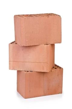 Stack of clay bricks isolated on white 写真素材