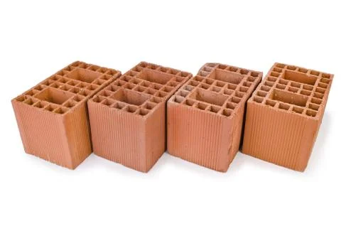 Stack of clay bricks isolated on white 写真素材