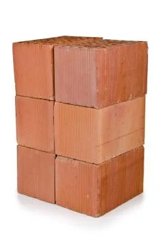 Stack of clay bricks isolated on white 写真素材