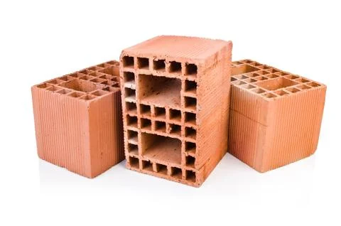Stack of clay bricks isolated on white Stock Photos