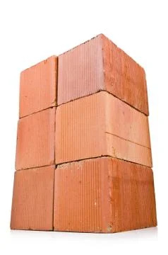 Stack of clay bricks isolated on white Stock Photos
