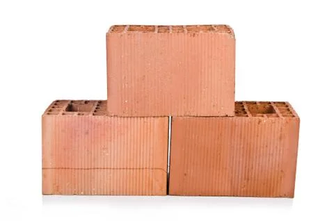 Stack of clay bricks isolated on white 写真素材