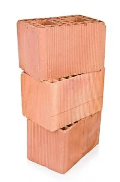 Stack of clay bricks isolated on white Foto stock