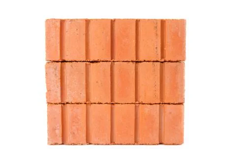 Stack of clay bricks in a wall Stock Photos