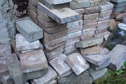 A stack of clay bricks.Material for construction. Stock Photos