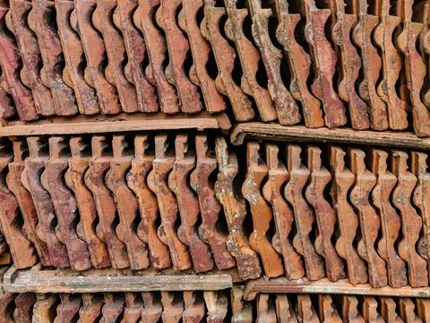 Stack with clay tiles that are worn out by time Foto stock