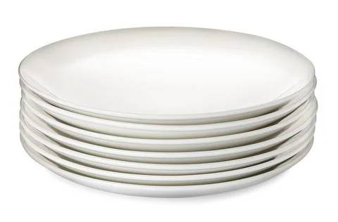 Stack of clean ceramic plates isolated on white Stock Photos