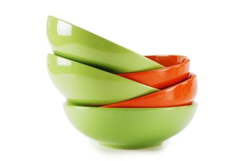 Stack of clean empty plates  isolated on white background Stock Photos