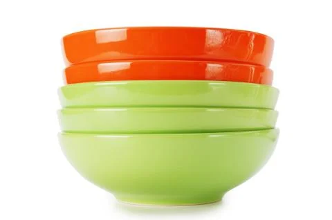 Stack of clean empty plates  isolated on white background Stock Photos