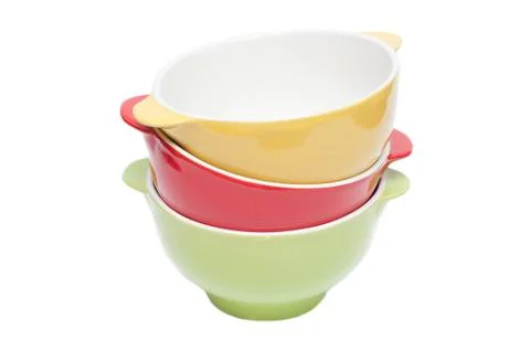 Stack of clean empty plates isolated on white background Stock Photos