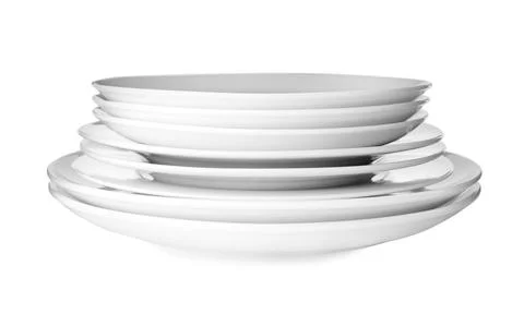 Stack of clean plates isolated on white Stock Photos