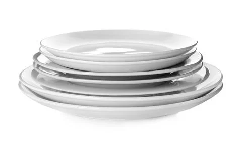 Stack of clean plates isolated on white Stock Photos