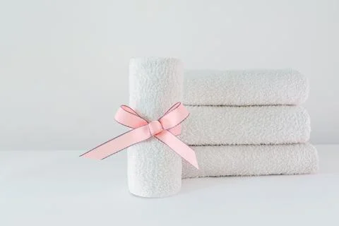 Stack of clean soft towels on white background Stock Photos