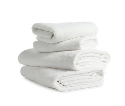 Stack of clean soft towels on white background 스톡 사진