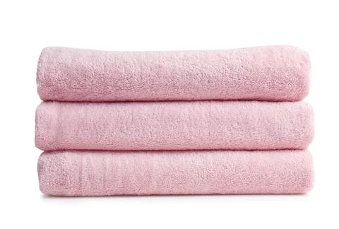 Stack of clean soft towels on white background Foto stock