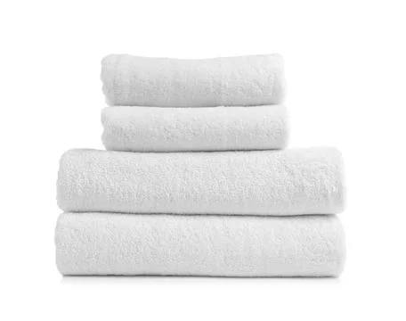 Stack of clean soft towels on white background Foto stock