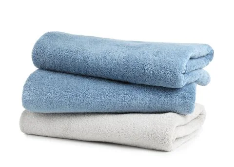 Stack of clean soft towels on white background Stockfoto's