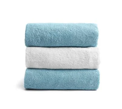 Stack of clean soft towels on white background 스톡 사진