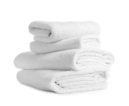 Stack of clean soft towels on white background Stockfoto's