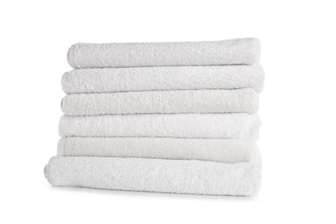 Stack of clean soft towels on white background Stock Photos