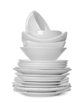 Stack of clean tableware isolated on white Stockfoto's
