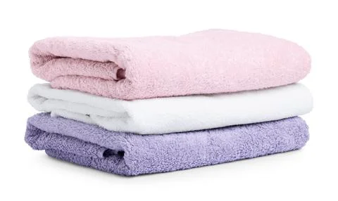Stack of clean towels isolated on white Stock Photos