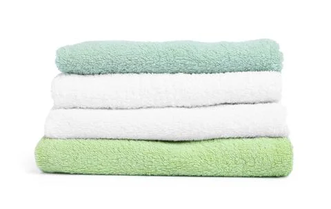 Stack of clean towels isolated on white Stock Photos