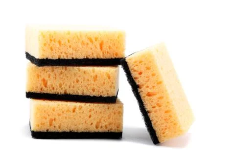 Stack of cleaning sponges on a white background. 写真素材