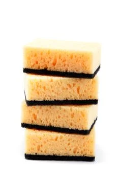 Stack of cleaning sponges on a white background. Stock Photos
