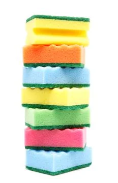 Stack of cleaning sponges on a white background. Stock Photos