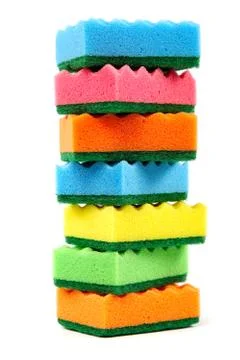 Stack of cleaning sponges on a white background. Stock Photos