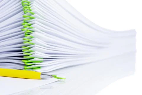 Stack of clipped blank paper sheet with pen Stock Photos