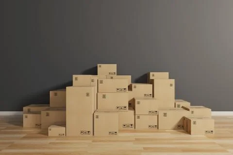 Stack of closed cardboard boxes wrapped with adhesive on the floor. Concept of Foto stock