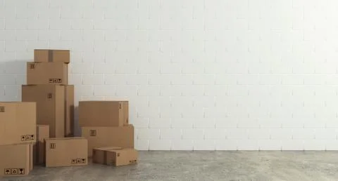 Stack of closed cardboard boxes wrapped with adhesive on the floor. Concept of 写真素材