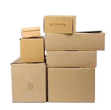 Stack of closed cardboard brown paper boxes isolated on white background Stock Photos