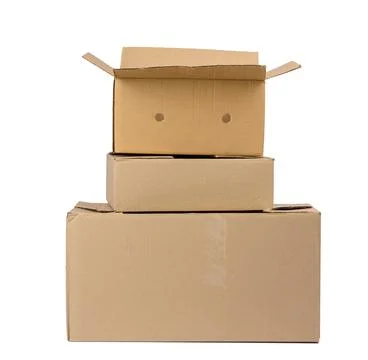 Stack of closed cardboard brown paper boxes isolated on white background Stock Photos
